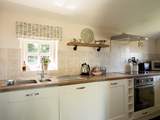 Sweet, well-equipped cottage kitchen.