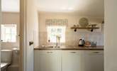Sunlight streams through the pretty cottage window.  - Thumbnail Image