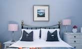Calming blues in the peaceful bedroom.  - Thumbnail Image