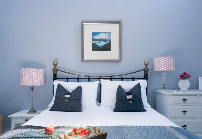 Calming blues in the blissful bedroom. 
