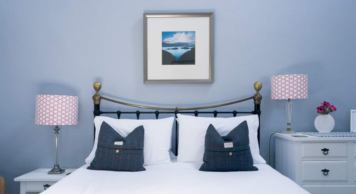 Calming blues in the peaceful bedroom. 