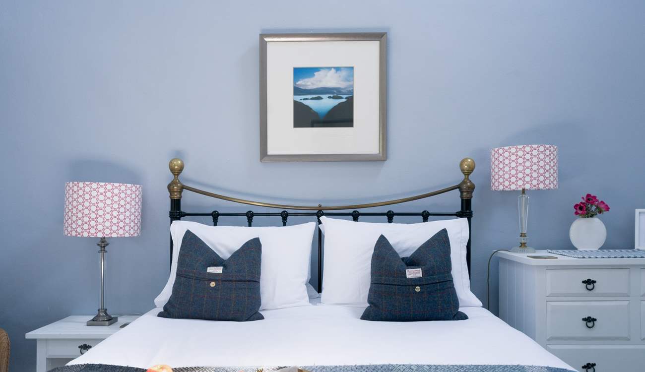 Calming blues in the blissful bedroom. 
