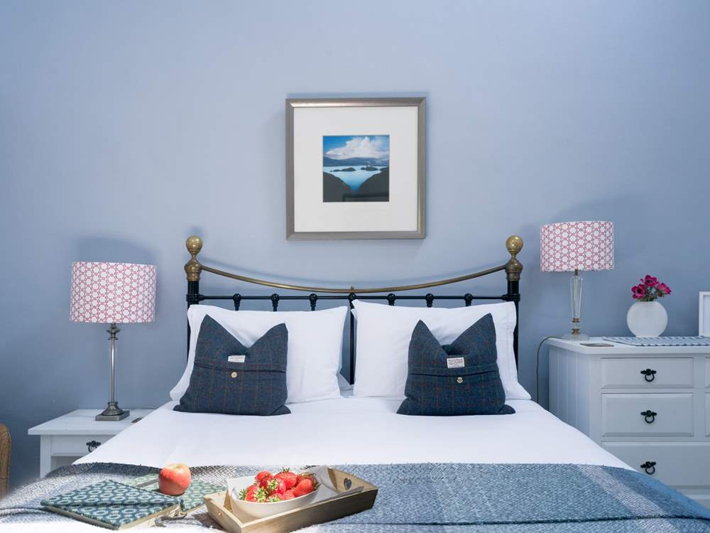 Calming blues in the peaceful bedroom.