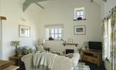Stylish throughout with beamed high ceilings and a  sea view. Perfect for relaxing after a day in the sea air.  - Thumbnail Image