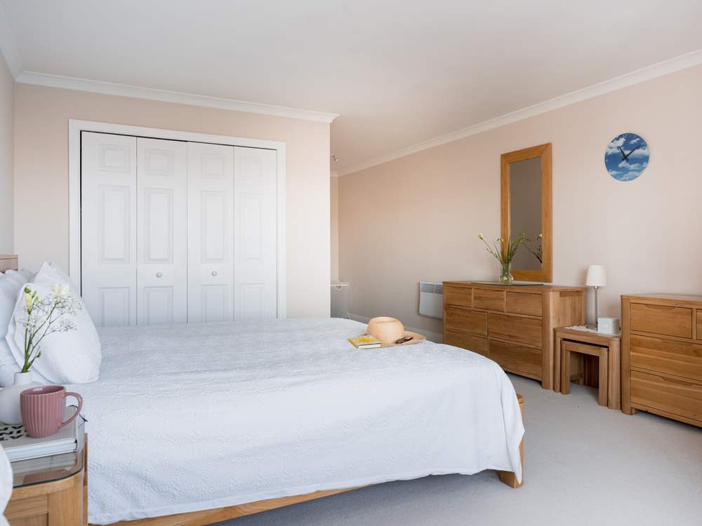 The main bedroom is so spacious, it is a lovely place to relax in your super-king bed.