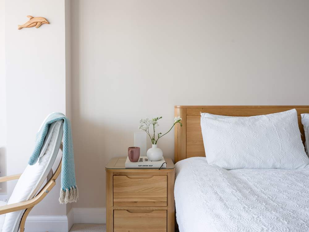 Lounge in bed with a good book.