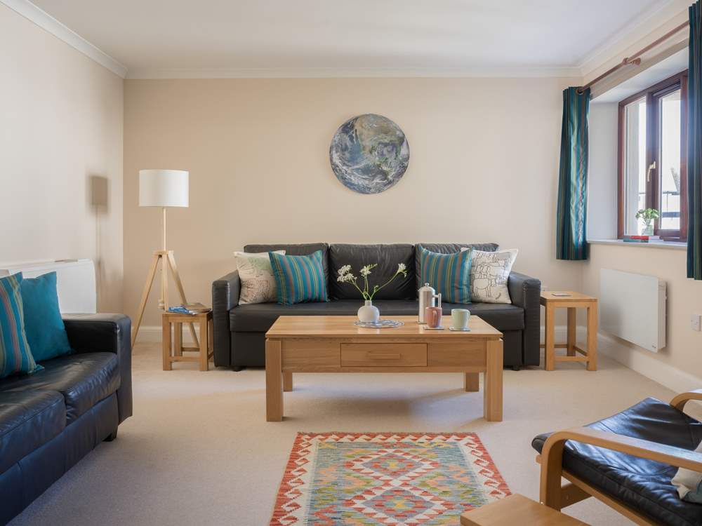 The sitting-room has plenty of space for everyone.