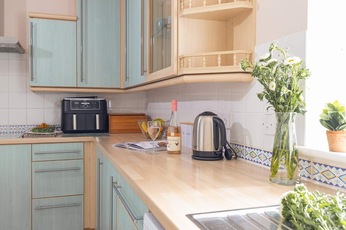 The kitchen is so well-equipped, it even has a Ninja air fryer.