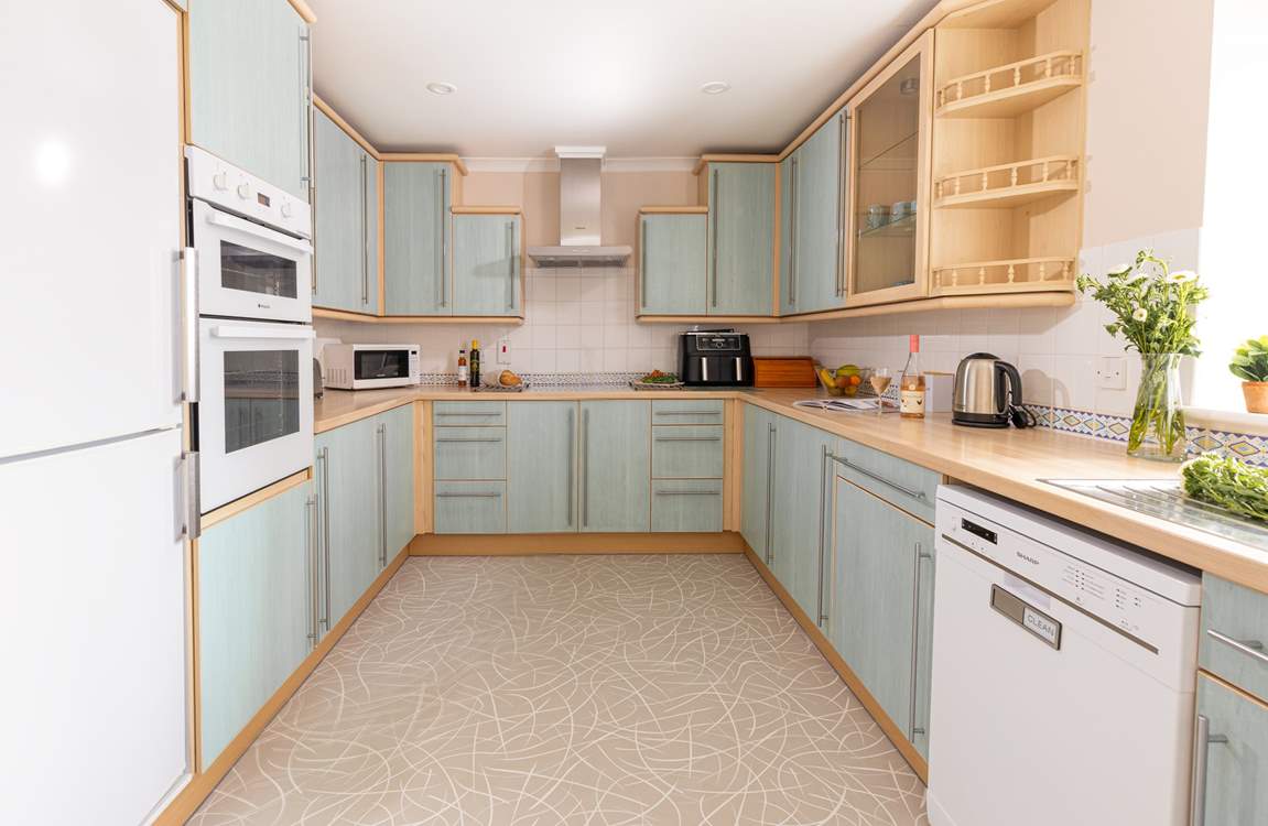 The spacious kitchen is just right for preparing a meal from fresh local produce.