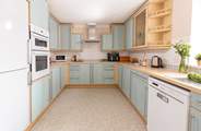 The spacious kitchen is just right for preparing a meal from fresh local produce.