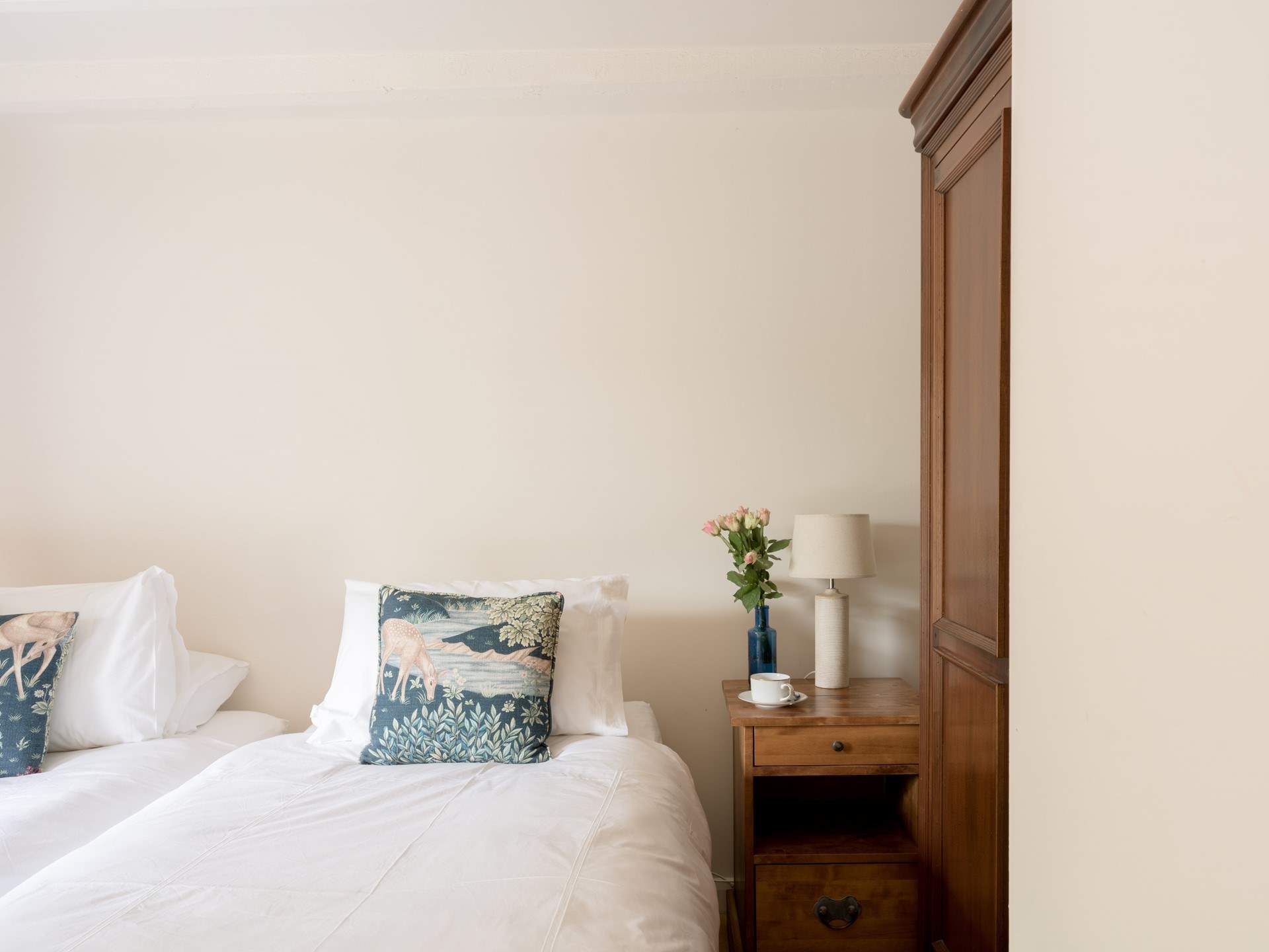 Pretty cushions grace the 'zip and link' beds. 