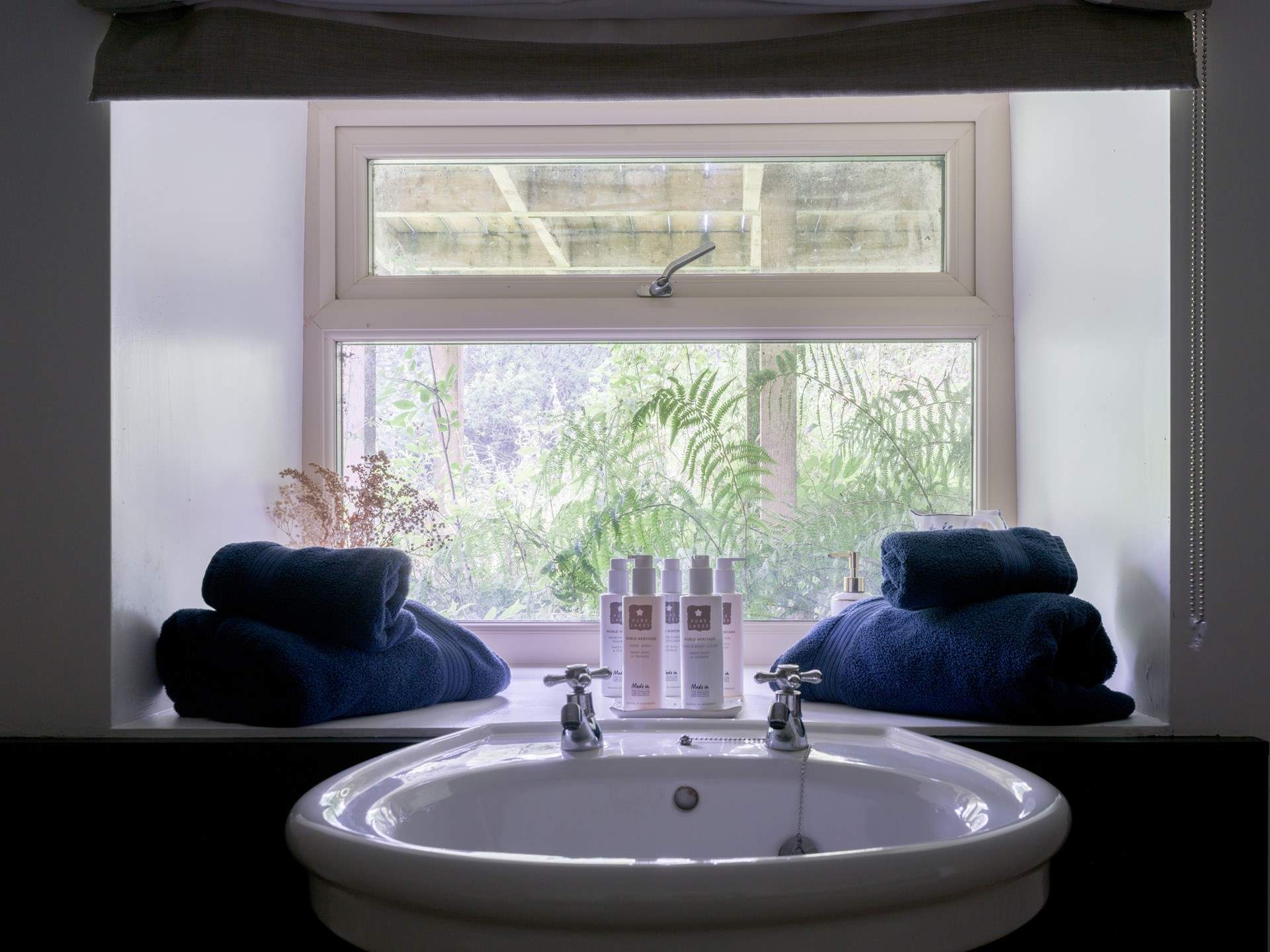 Local toiletries are showcased in this gorgeous bathroom. 