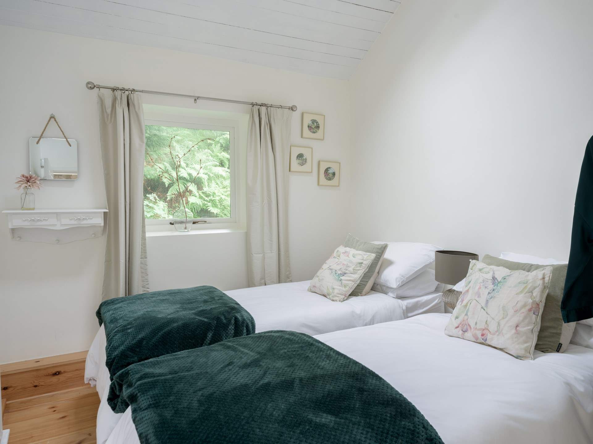 Bedroom 2 is light and airy.