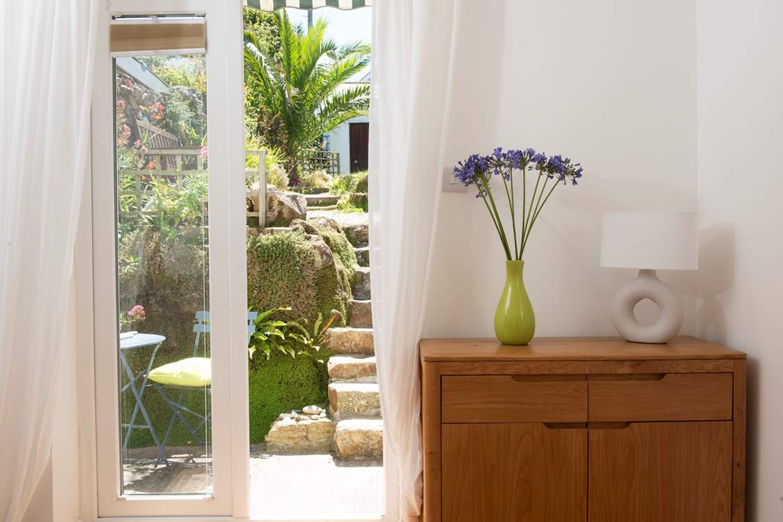 Take your morning coffee outside in the enclosed garden.