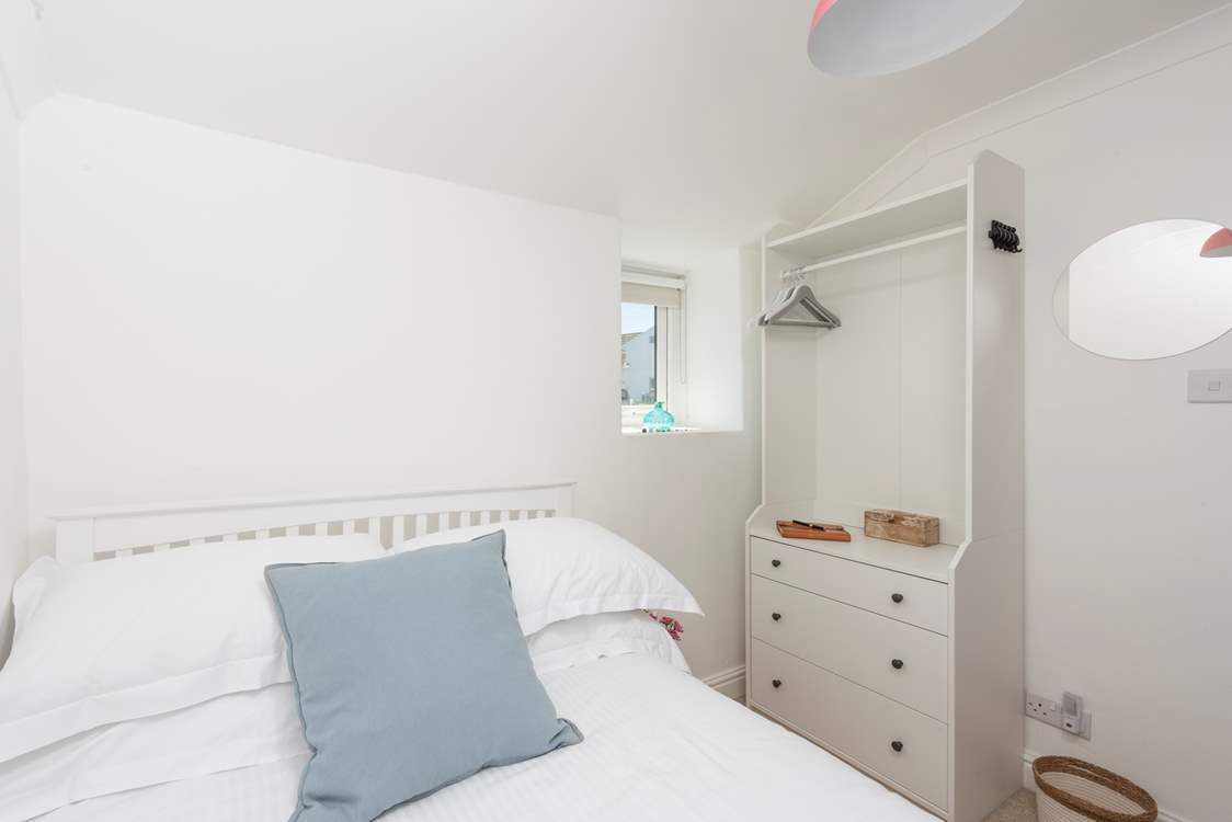 A clever use of space, sleep tight in this sweet bedroom.