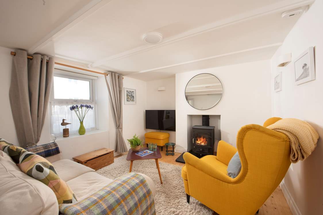 Snuggle up in the homely sitting-room.