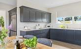 The kitchen is not only stylish but incredibly well-equipped. - Thumbnail Image