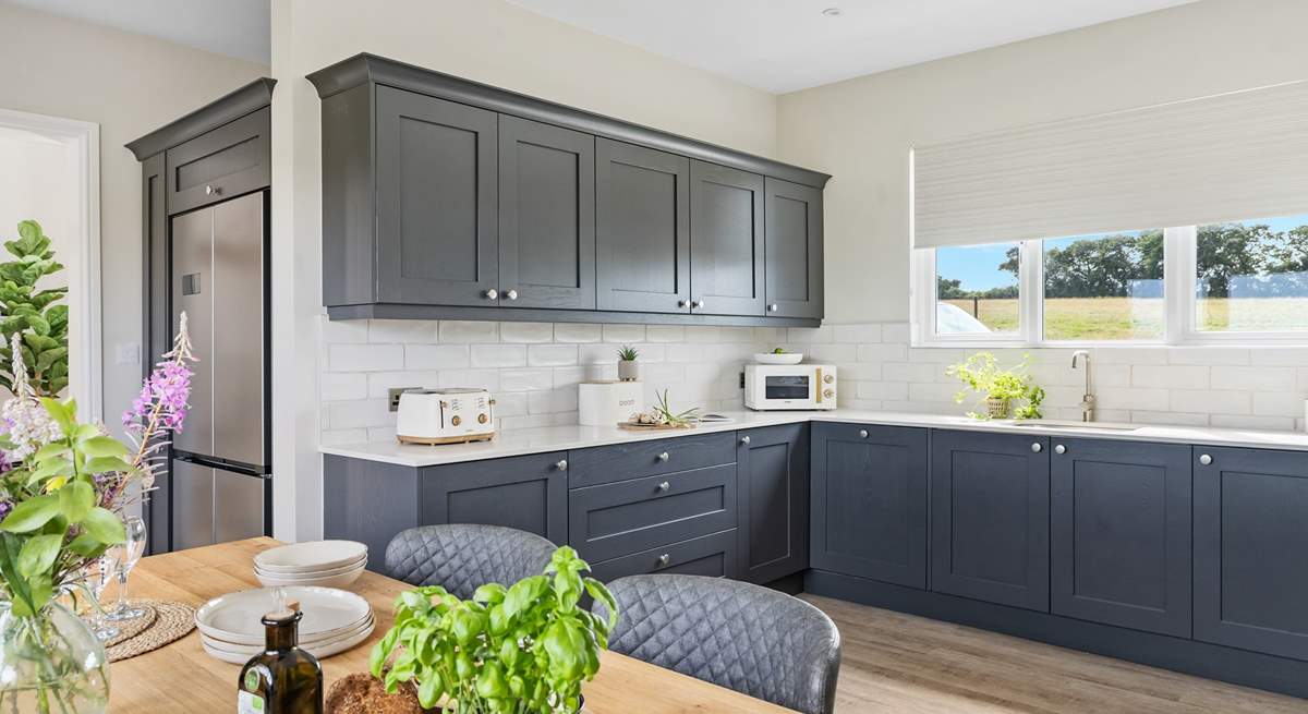 The kitchen is not only stylish but incredibly well-equipped.