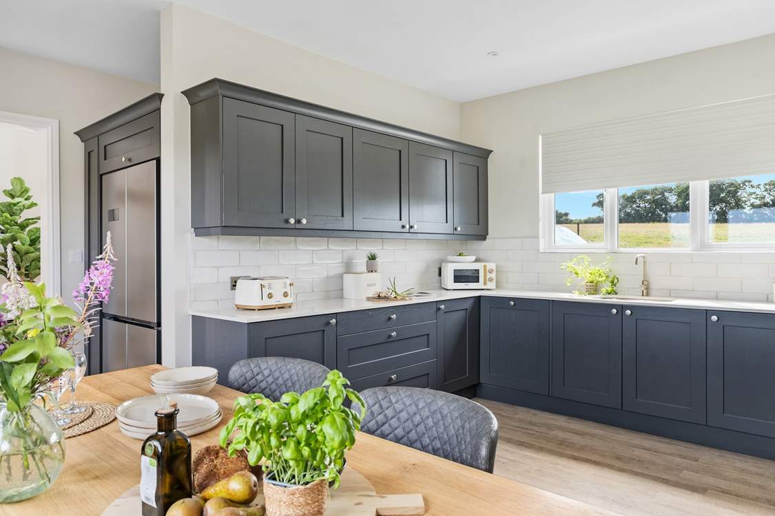 The kitchen is not only stylish but incredibly well-equipped.