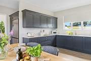 The kitchen is not only stylish but incredibly well-equipped.