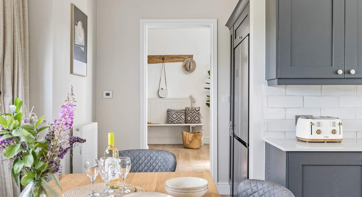 The kitchen/dining-room is a step down from the hallway.