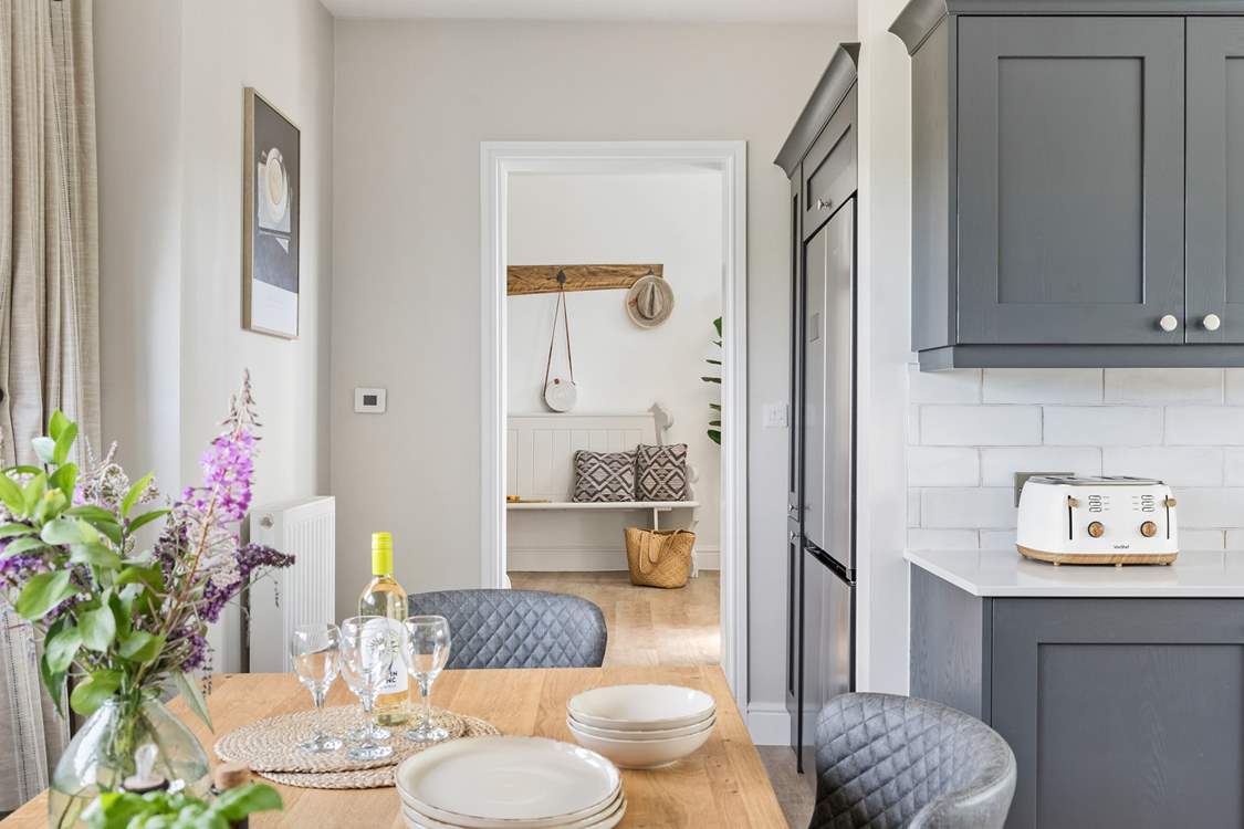 The kitchen/dining-room is a step down from the hallway.