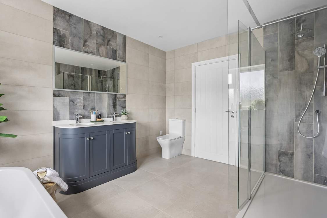 The spacious family bathroom is a real treat. With twin sinks and a large shower and...