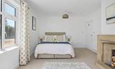Swathed in sumptuous bedding, throws and cushions, you're guaranteed a blissful night's sleep. - Thumbnail Image