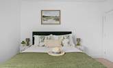 A comfy king-size bed awaits in bedroom 1. - Thumbnail Image