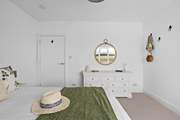 The soft furnishings complement the setting.