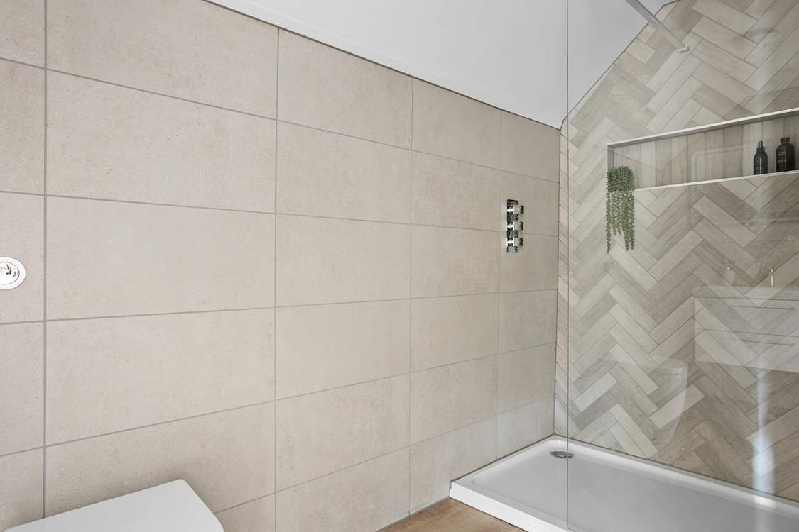 This bedroom also has its own en suite shower-room.