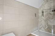 This bedroom also has its own en suite shower-room.