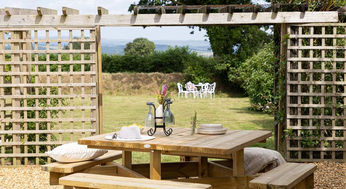 Another table on the side terrace, next to the hot tub.