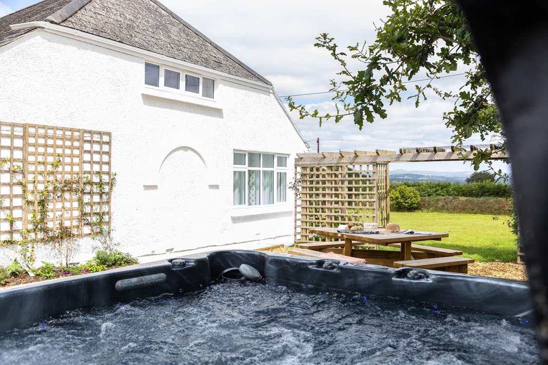 Relax in the bubbling hot tub.
