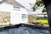 Relax in the bubbling hot tub.