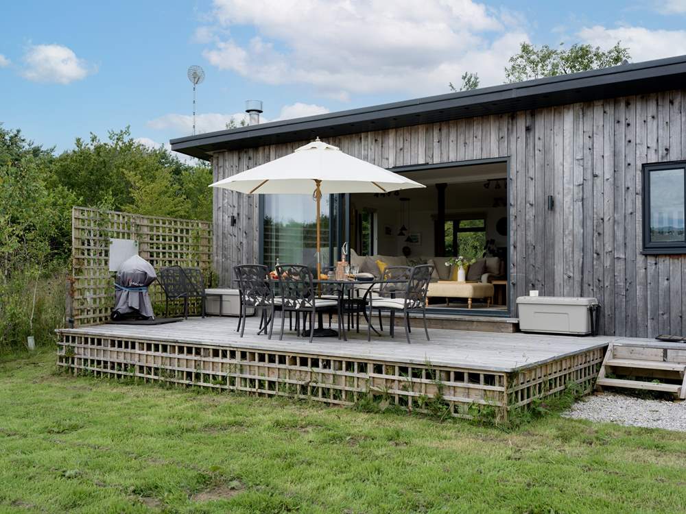 The decking is the perfect spot to enjoy the view and tranquility of the setting.