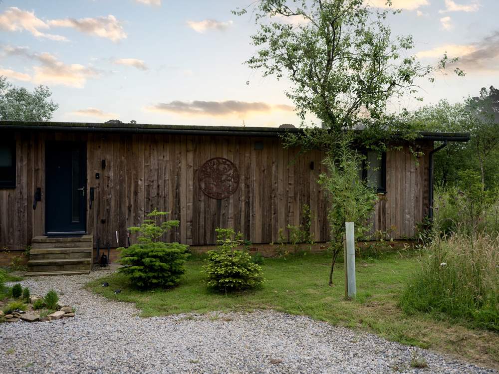 Park up and take the three steps to the front door of this lovely abode.