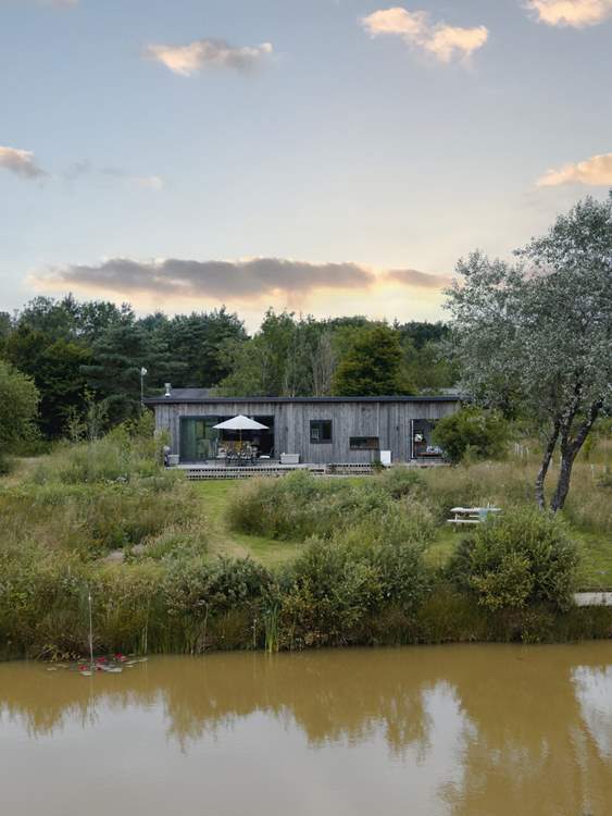 Venture out early and cast a line out from the fishing platform.