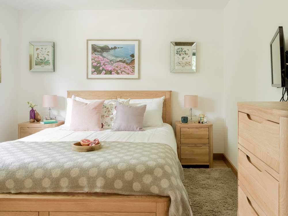 Bedroom 2 is oh so pretty and ready for your arrival.