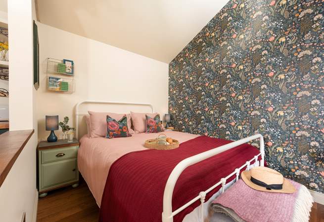 The soothing tones in the bedroom reflect the surrounding countryside. 