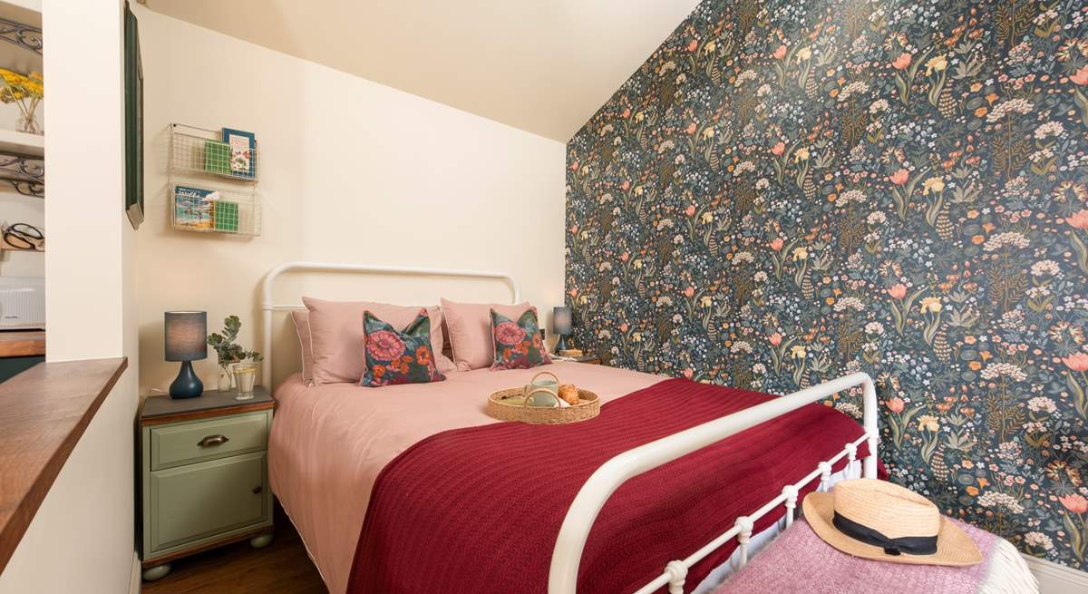 The soothing tones in the bedroom reflect the surrounding countryside. 