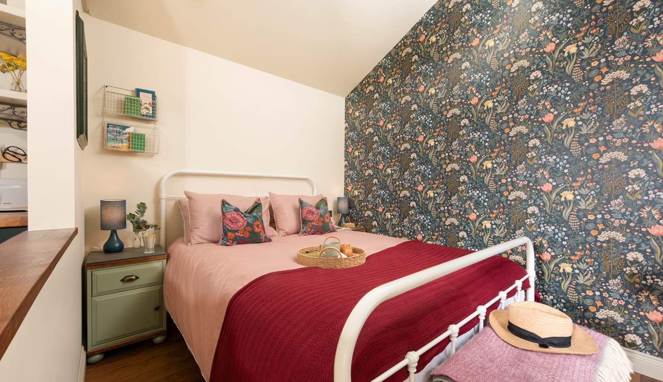 The soothing tones in the bedroom reflect the surrounding countryside. 