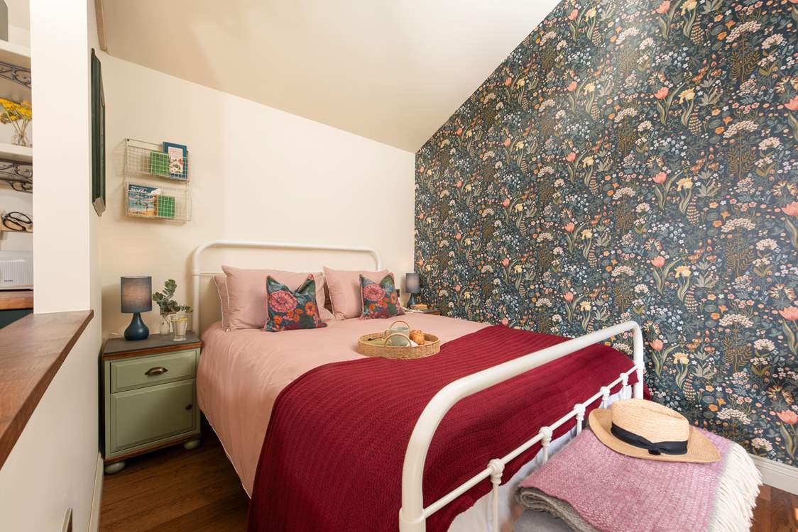 The soothing tones in the bedroom reflect the surrounding countryside.