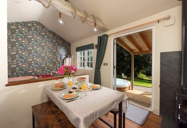 Open the doors and admire the serene rural setting.