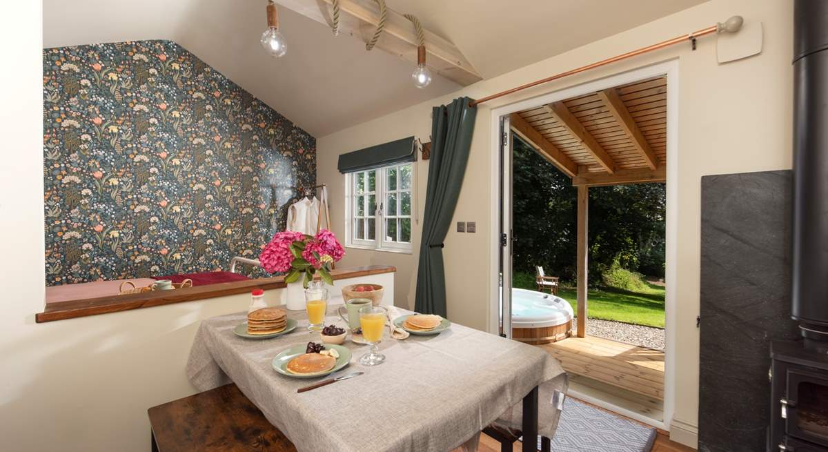 Open the doors and admire the serene rural setting.