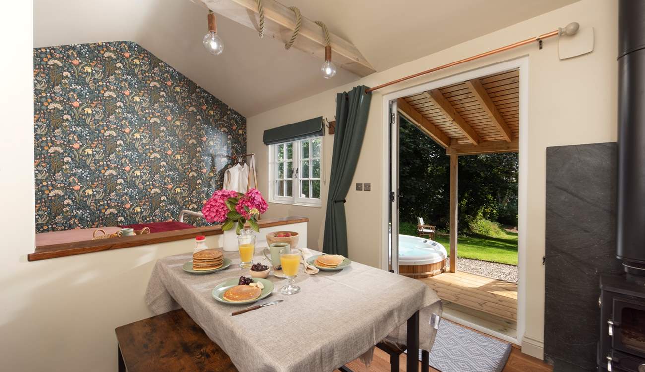 Open the doors and admire the serene rural setting.