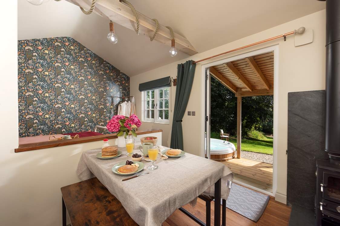 Open the doors and admire the serene rural setting.
