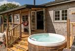 Sink into the bubbling hot tub at this peaceful Cornish retreat for two. 