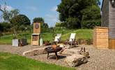 Soak up sun-kissed days in the dreamy outdoor space. - Thumbnail Image