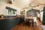 The kitchen is modern and well-equipped. 